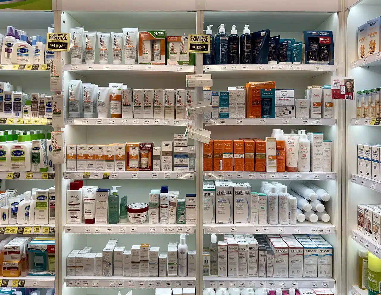 Skincare bottles and jars arranged on a light surface