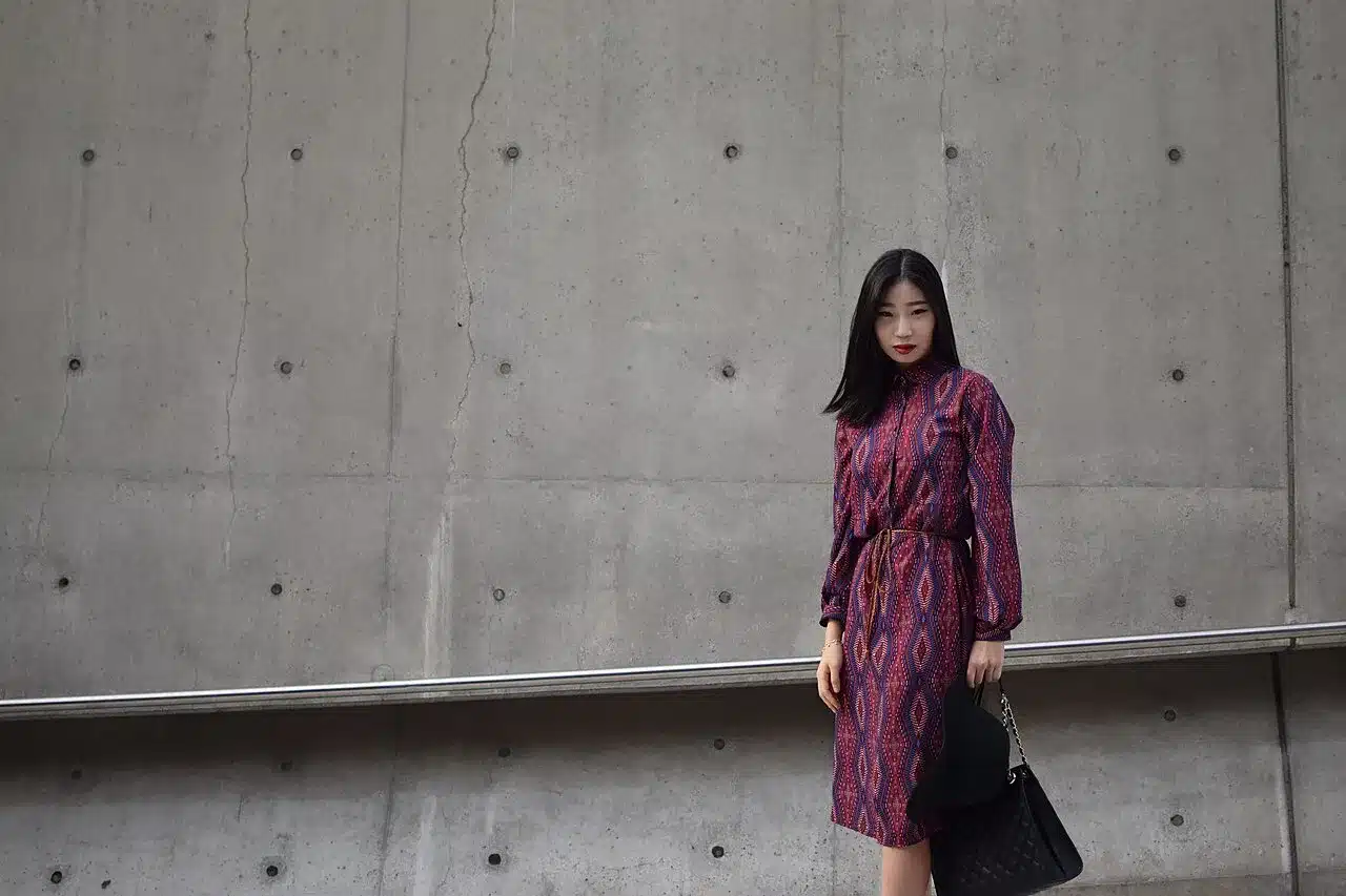 A woman wearing a fashionable dress, womenswear styling idea